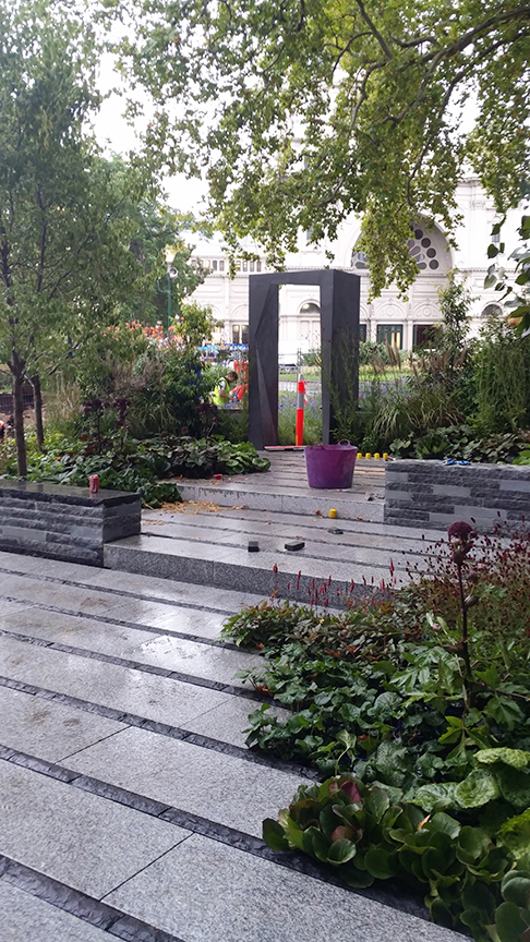 Paving doorway and bench seats are complete in Cross Roads desinged by Melbourne Garden Design company Ian Barker Gardens